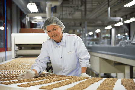 Operator working on chocolate production line